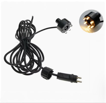 SGSLT 6LED underwater light illuminating a fountain with a warm glow