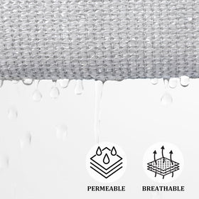 Shade&Beyond curved-edge sail preventing water pooling during light rain.