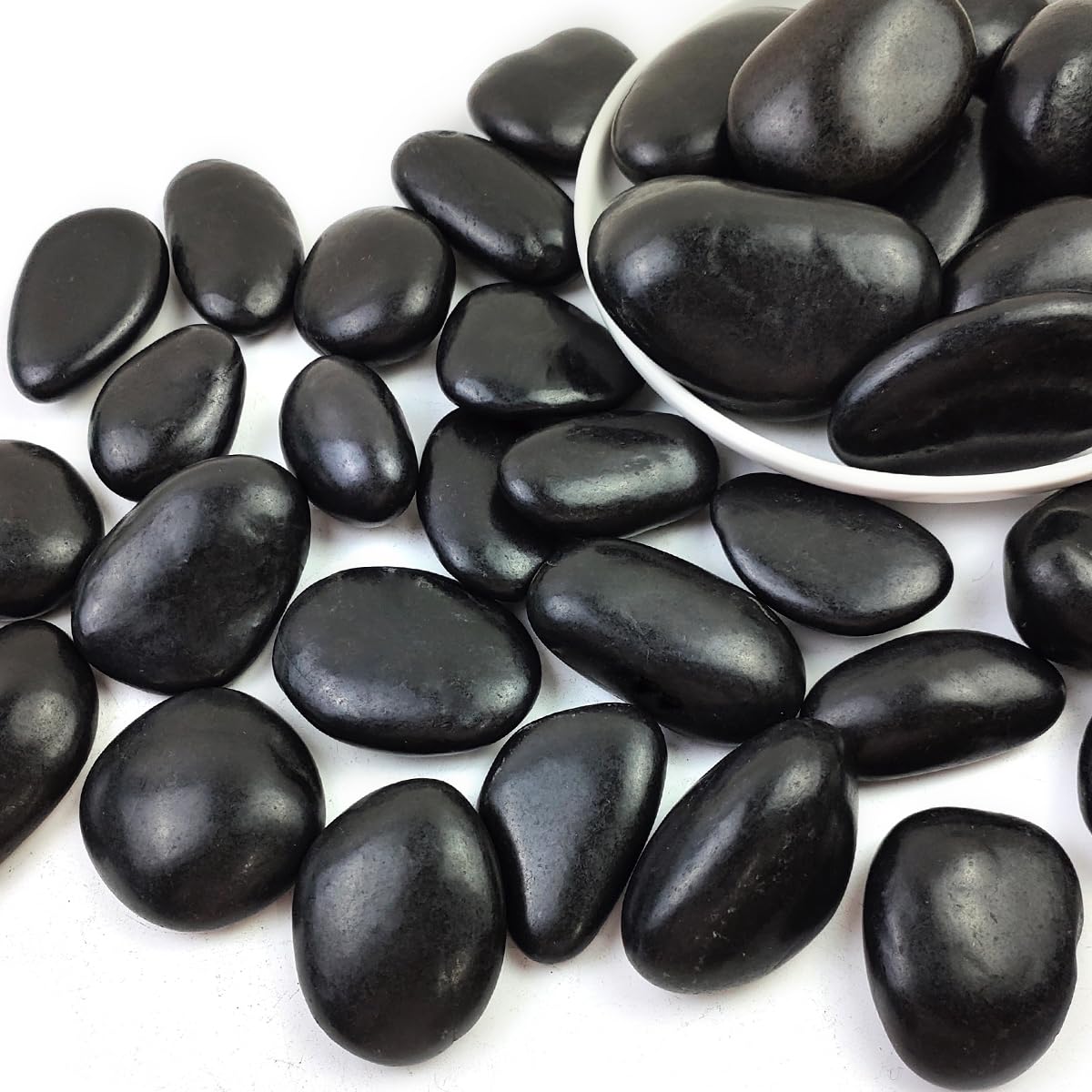 SHIZWU natural black river rocks, 2-3 inch, ideal for striking outdoor landscaping and drainage.