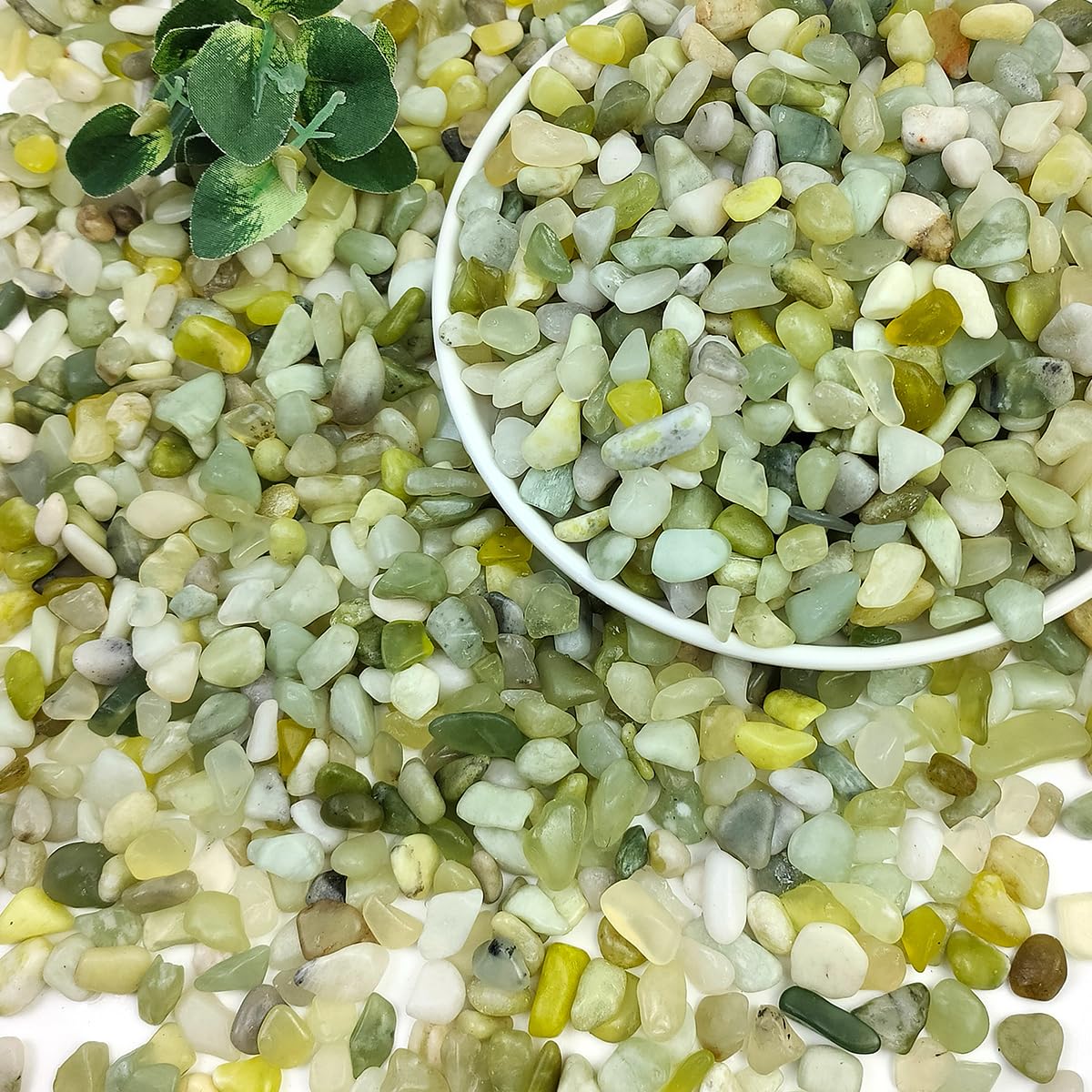 SHIZWU jade pebbles 3/8 inch in pots for moisture retention and aesthetic appeal.