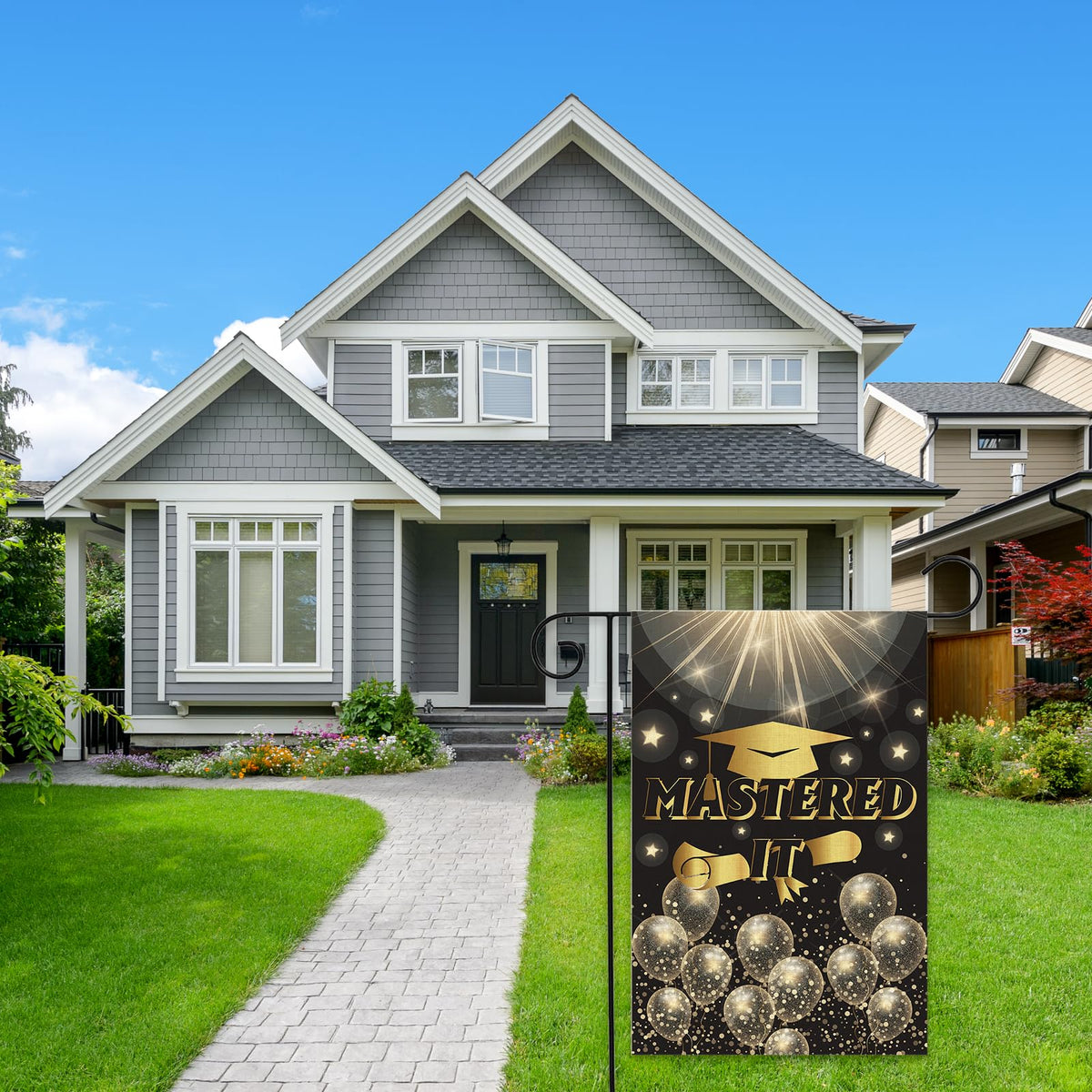 ShuanQ Mastered It flag in yard creates a festive graduation ambiance.