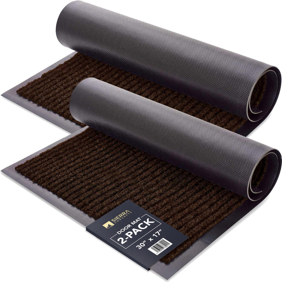 Sierra Concepts front door mat in dark brown welcomes guests and shields interiors from dirt.