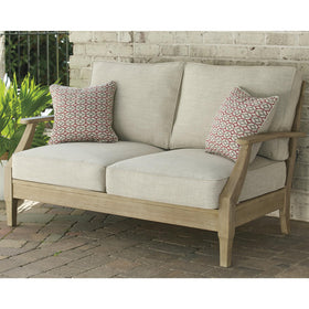 Signature Design by Ashley Clare View outdoor loveseat with cushions for comfortable seating