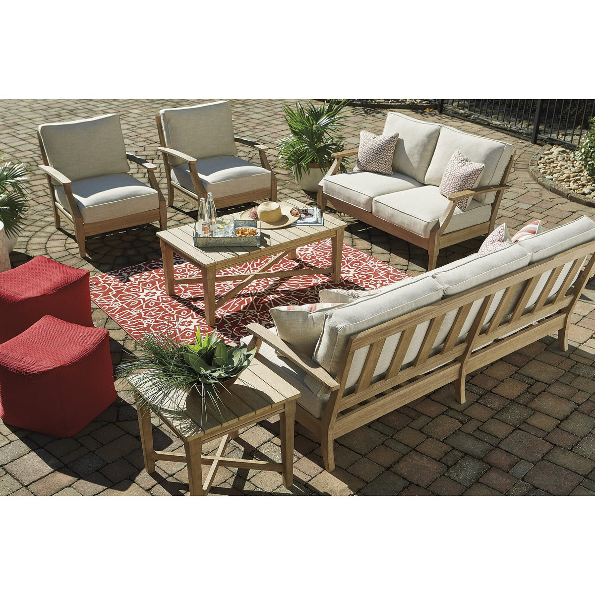 Signature Design by Ashley Clare View outdoor sofa in beige finish complements any deck.