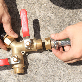 SIGURANTA barbed connector shown linking hose to faucet in a yard setting