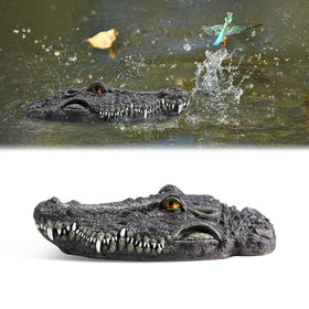 Silipull floating alligator head decoy deters pond wildlife with a lifelike silhouette.