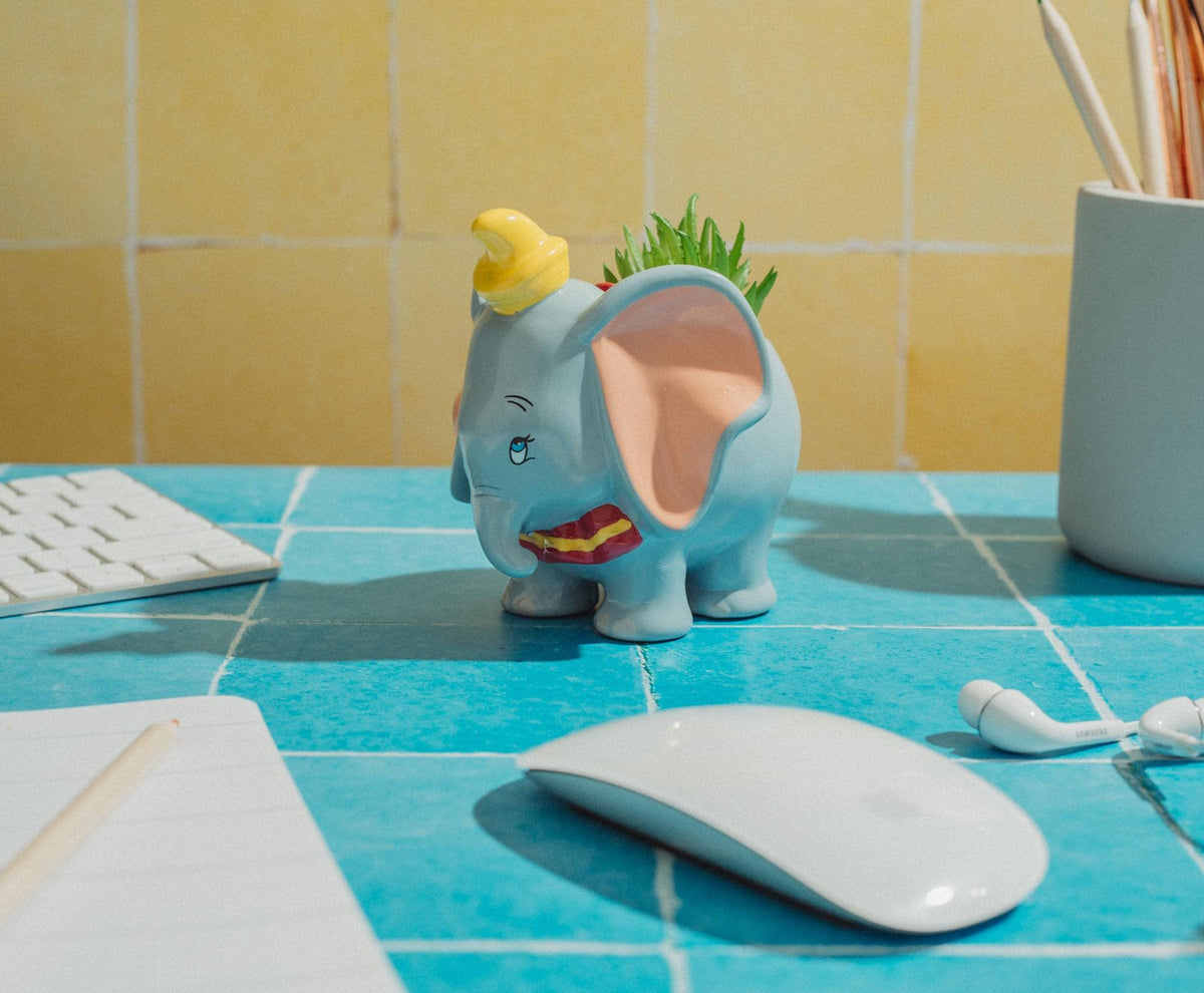 Officially licensed Silver Buffalo Dumbo planter for Disney enthusiasts.