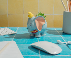 Officially licensed Silver Buffalo Dumbo planter for Disney enthusiasts.