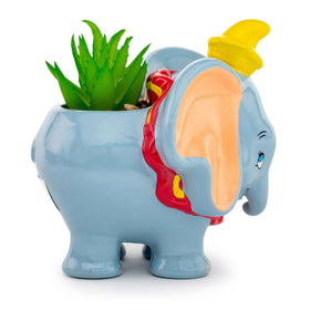 Silver Buffalo Dumbo ceramic planter with faux plant ideal for shelves.