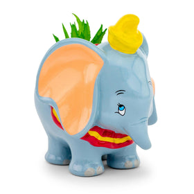 Silver Buffalo Dumbo planter side view with faux plant adds low-maintenance greenery.