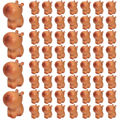 Simgoing capybara figurines on cake toppers with brown resin detail