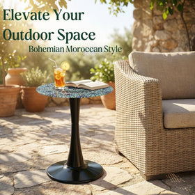 Simmer Stone round patio table with tempered glass top adds color to any balcony.