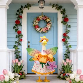 Sinbana butterfly outfit on a goose statue creates a festive focal point.