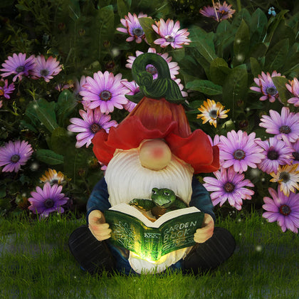 Sinhra garden gnome reading a book with turtle, solar LED lights for cozy evenings.