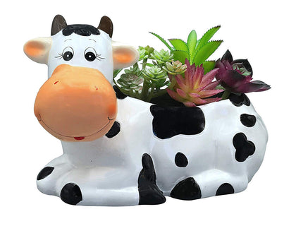 Sixdrop cow planter pot ceramic with drain, ideal for herbs in a sunny kitchen window.