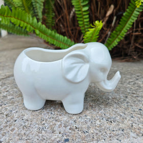 SJBAG Elephant ceramic texture adds handmade charm to shelves.