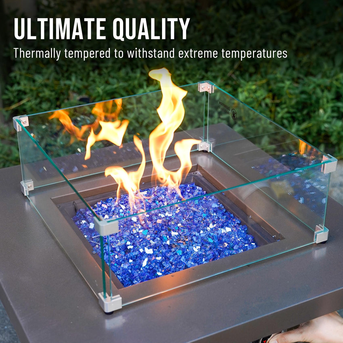 Skyflame cobalt blue fire glass in a fireplace at night.