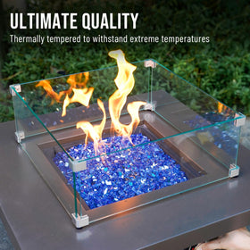 Skyflame cobalt blue fire glass in a fireplace at night.