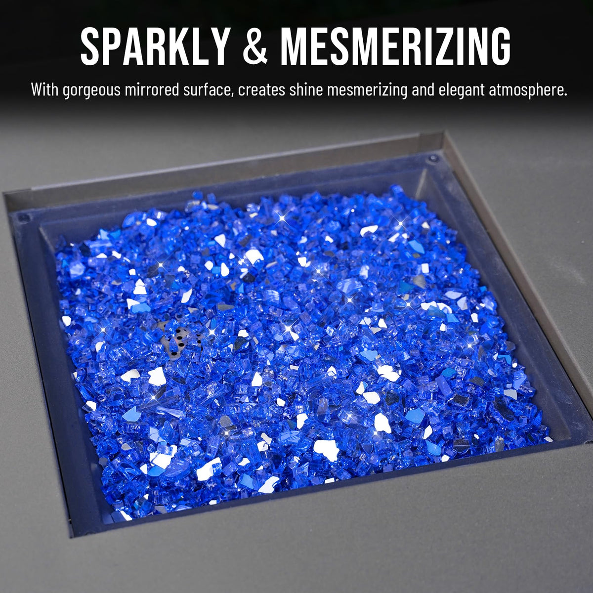 Skyflame cobalt blue fire glass edging a landscaped feature.