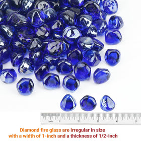 Skyflame cobalt blue half-inch fire glass diamonds in a gas fire pit setup