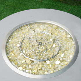 Skyflame fire pit setup with glass rocks and accessories.
