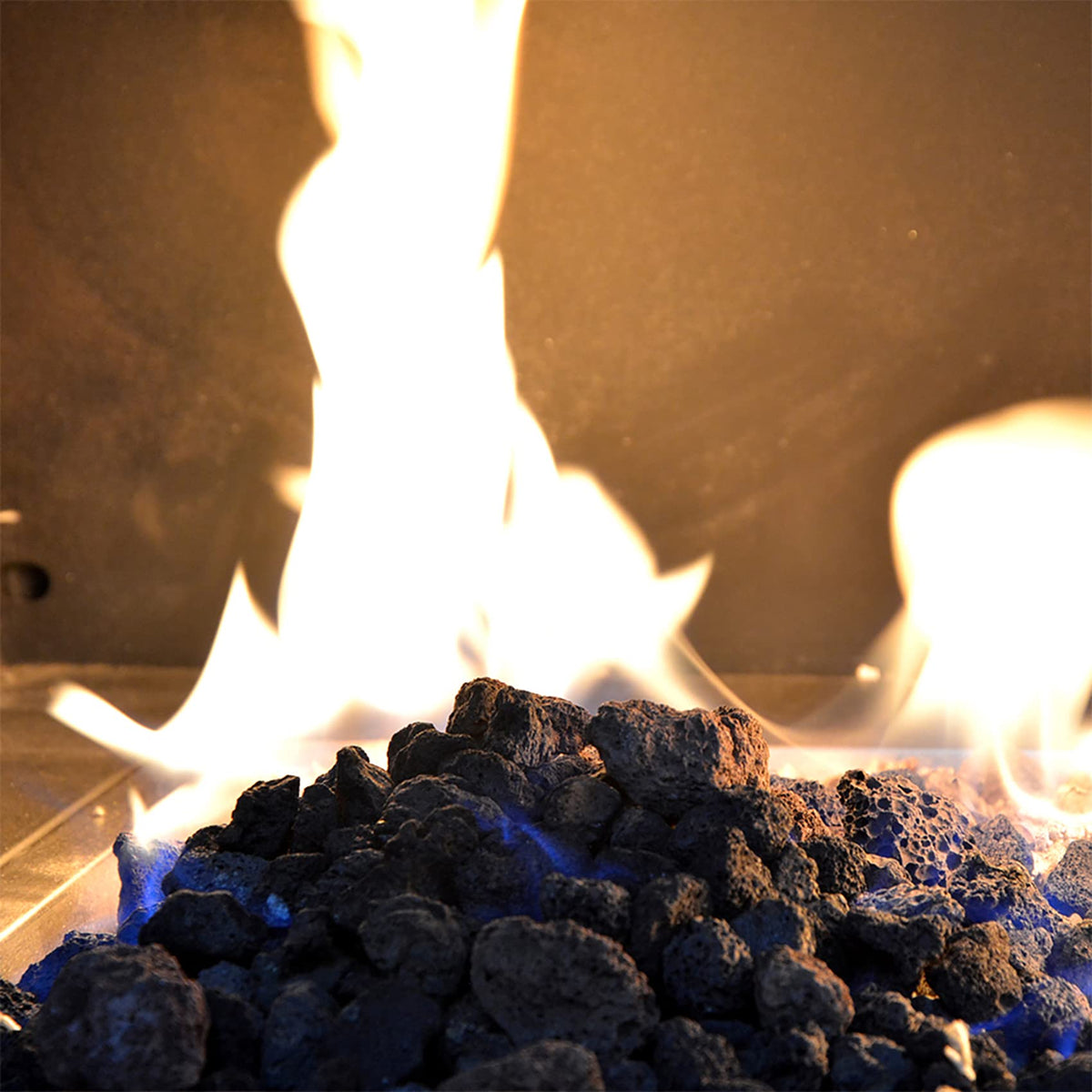 Skyflame lava rock granules used as decorative landscape mulch in garden beds