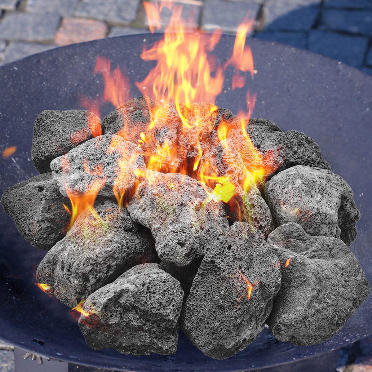 Skyflame natural lava rocks in garden edging show moisture retention and decorative flair.