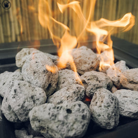 Skyflame lava rocks 3-5 inch in garden landscapes provide durable decorative styling.