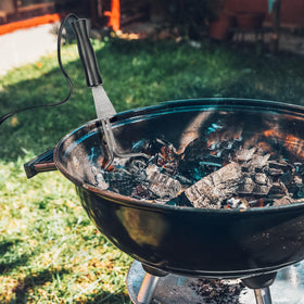 Skyflame reusable starter in action for indoor and outdoor grilling