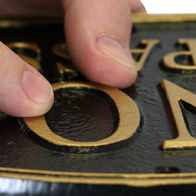 SmartSign gold and black color scheme complements traditional and modern exteriors