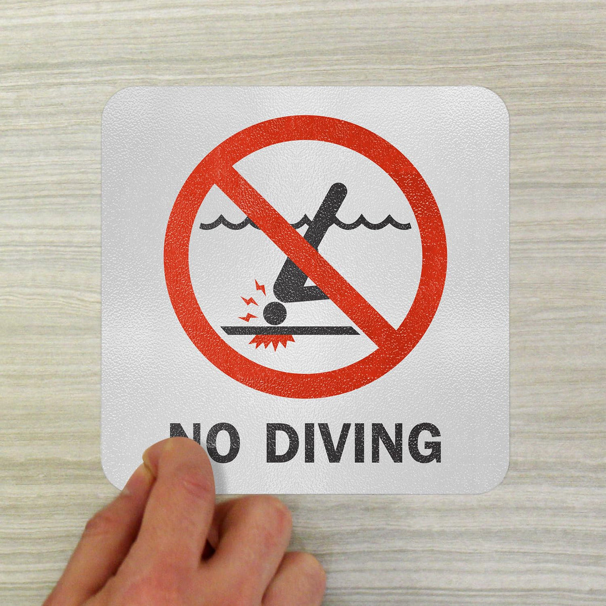 Made in USA label on SmartSign pool safety marker for quality assurance.