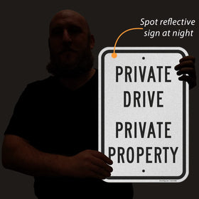 SmartSign 18x12 drive sign showing pre-punched holes for easy installation.