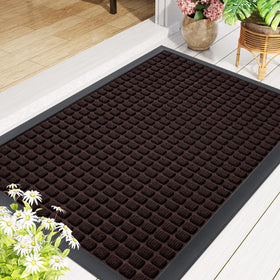 Smiry brown color mat complements entryway decor.