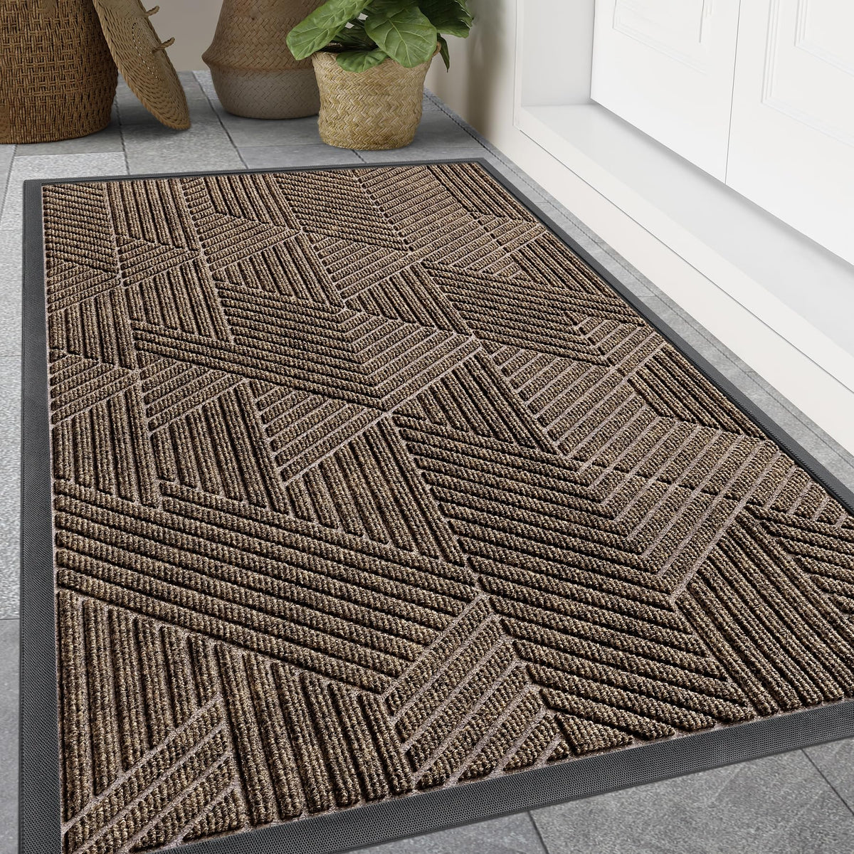 Smiry front door mat for outdoor entrance keeps dirt at bay.