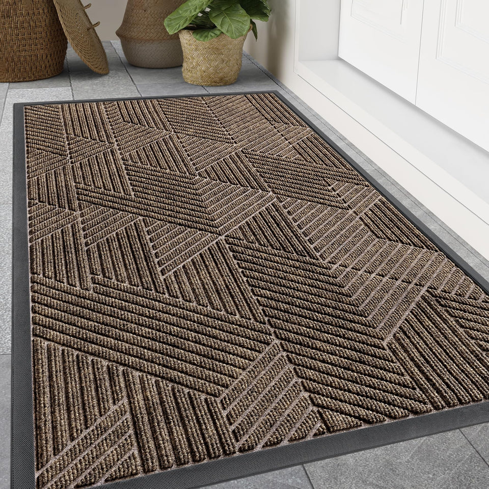 Smiry front door mat for outdoor entrance keeps dirt at bay.