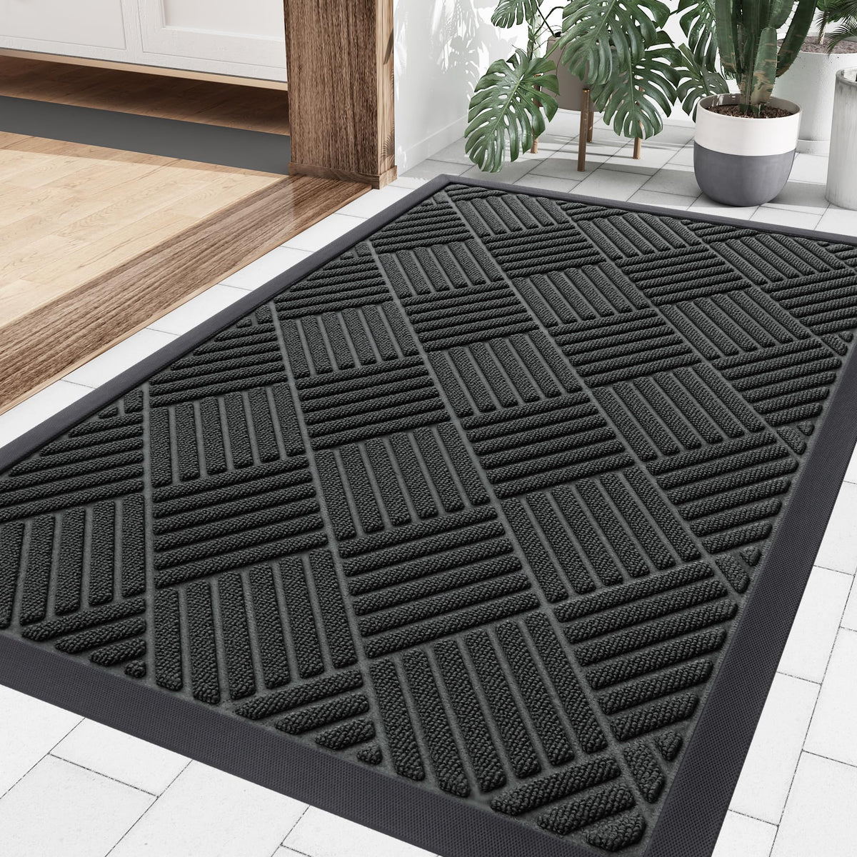 Smiry front door mat outside entrance captures dirt and moisture for a cleaner entry.