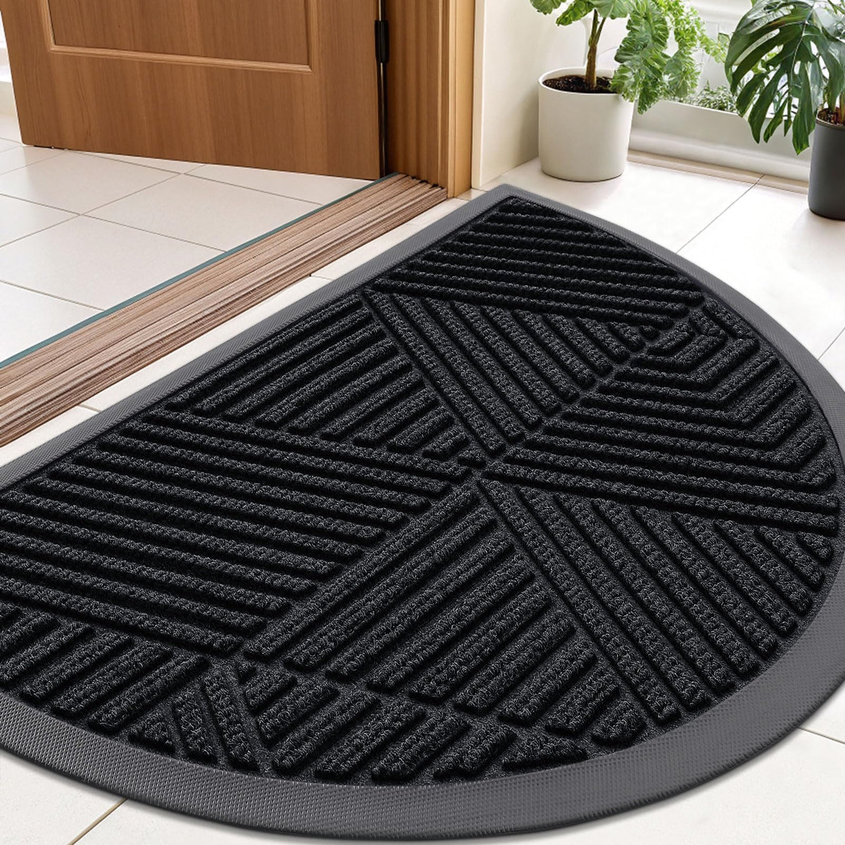 Smiry half-circle front door mat traps moisture and dirt at the entry.