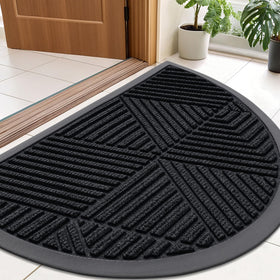 Smiry half-circle front door mat traps moisture and dirt at the entry.