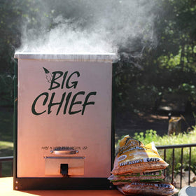 Smokehouse Big Chief interior with five racks for large batches.
