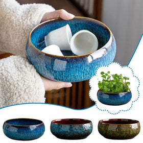 Smowfes ceramic planter demonstrated for leak-free water arrangements.