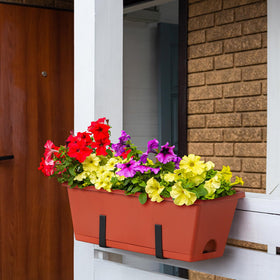 Smusei compact herb garden arrangement on a balcony using four planters