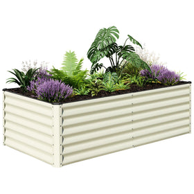 SnugNiture galvanized raised garden bed in assembly progress for backyard planting.