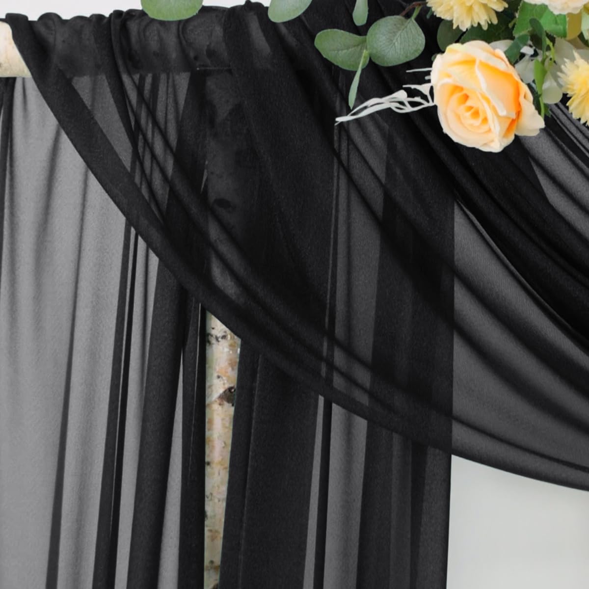 Socomi black sheer drape panel forming a romantic canopy with soft folds.