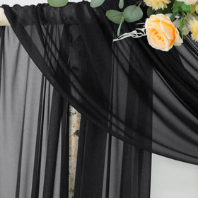 Socomi black sheer drape panel forming a romantic canopy with soft folds.
