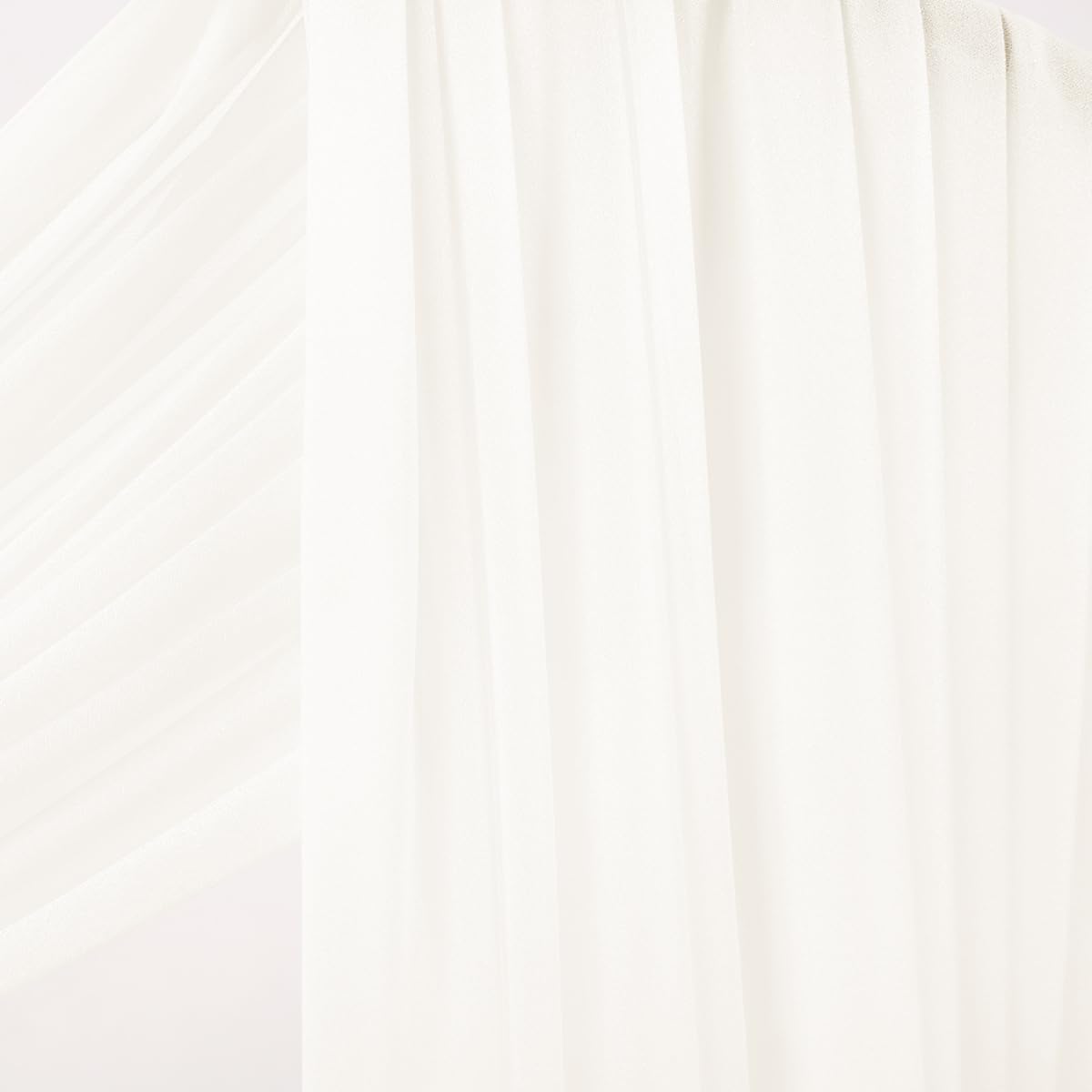 Socomi Ivory White sheer fabric adds delicate ambiance and versatile decorative swags.