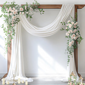 Socomi Ivory White wedding arch draping on an arch creates an elegant ceremony backdrop.