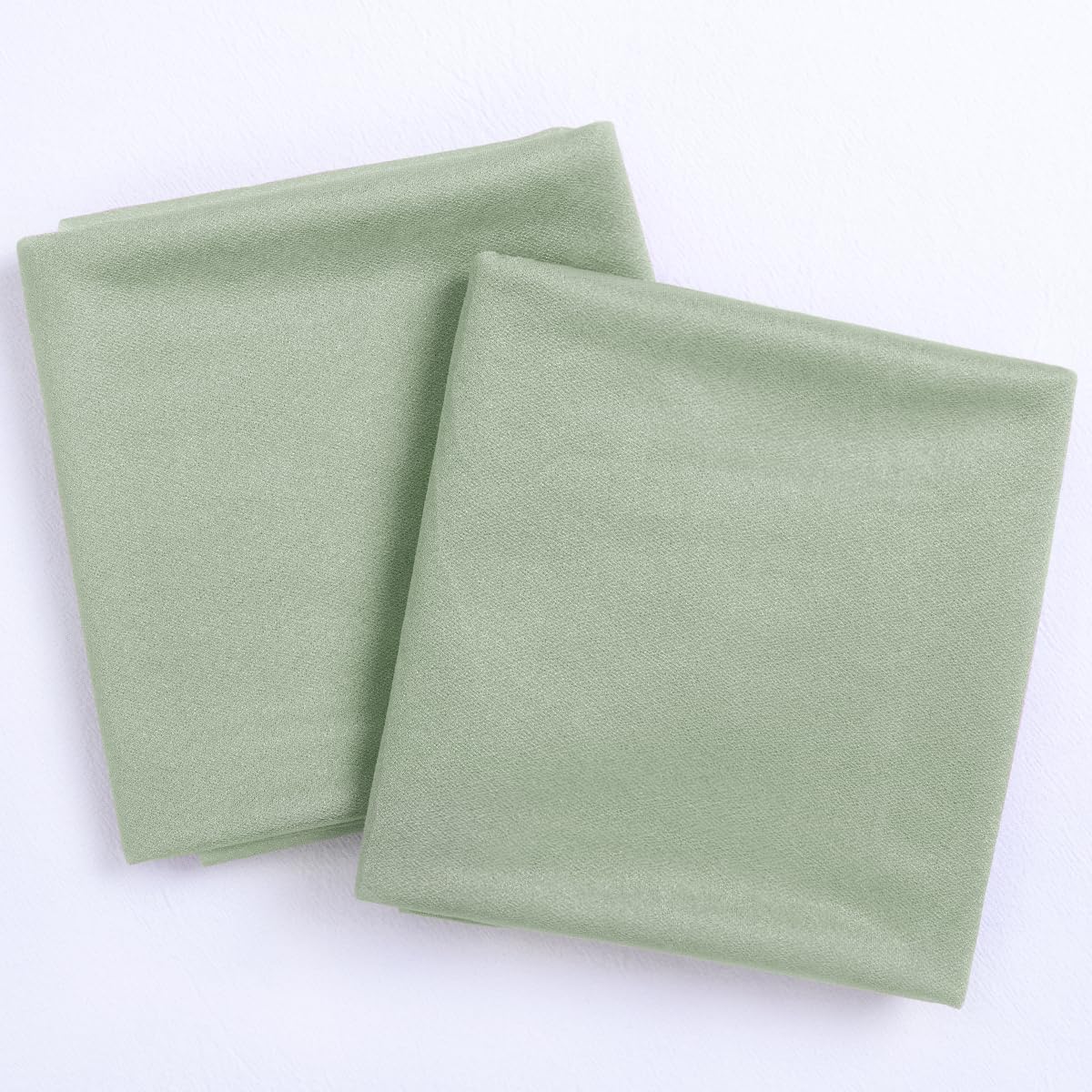Socomi Sage Green sheer panels creating elegant backdrop for photos