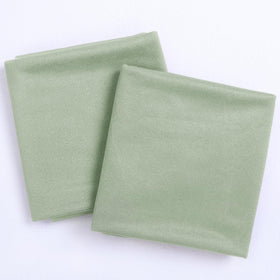 Socomi Sage Green sheer panels creating elegant backdrop for photos