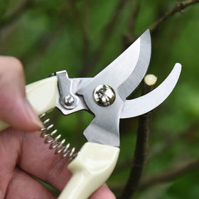 SoftSense pruning shears stainless steel blade for precise branch trimming.