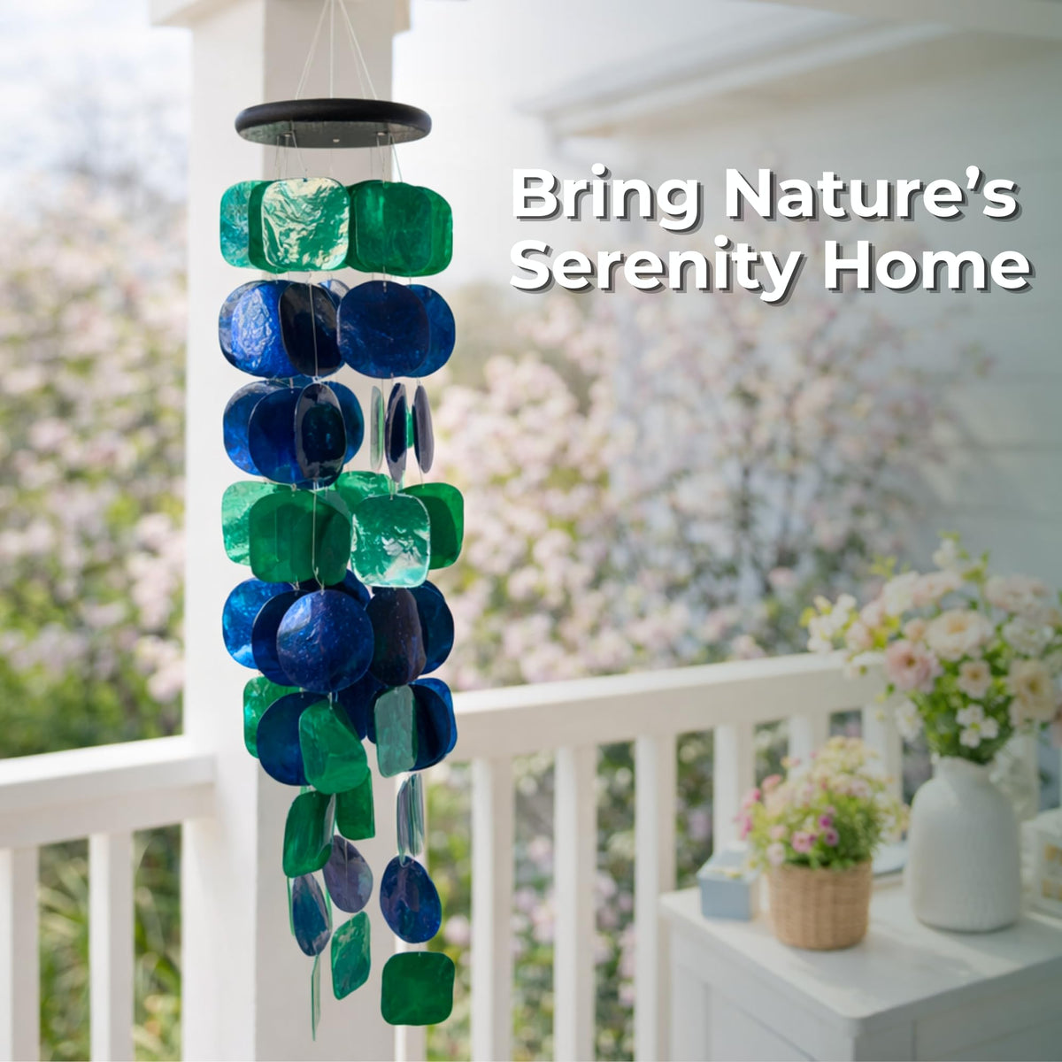 Solange & Frances wind chimes on a front porch add coastal charm and light sound.